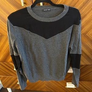 Paneled gray and black sweater